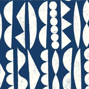 May include: A fabric pattern featuring a deep blue background with repeating white geometric shapes including circles, triangles, and semi-circles. The white elements have a textured, hand-stamped appearance arranged in vertical columns.