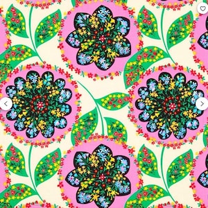 May include: A seamless pattern featuring pink, green, and black floral designs. The pattern is made up of repeating circles with a cluster of flowers in the center. The flowers are surrounded by a ring of smaller flowers and leaves.