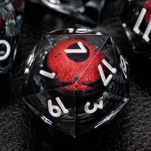 D and D Beholder's Liquid Flow Core Eye Resin Dice Set | Dnd Dungeons and Dragons Pathfinder Role Playing Game Dice | D20 D&D Red Black Dice