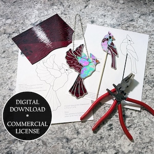 May include: A stained glass cardinal suncatcher with iridescent and deep red glass, a smaller cardinal piece on a wooden dowel, a sheet of red glass, paper patterns, and metal pliers. A black circular badge reads DIGITAL DOWNLOAD COMMERCIAL LICENSE.