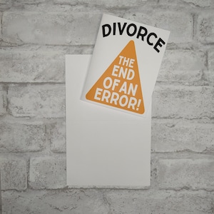 May include: A white card with a black triangle and the text "DIVORCE" at the top. Inside the triangle is the text "THE END OF AN ERROR!" in black.