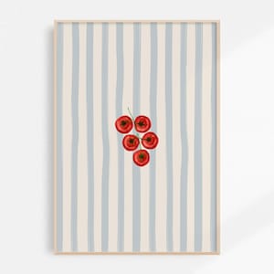 May include: A framed art print showing a watercolour illustration of a cluster of red tomatoes on a green stem. The background has vertical stripes in light blue and cream colours. The frame is a light wood colour.