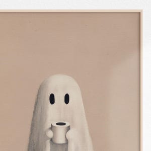 May include: A whimsical illustration of a ghost holding a roll of toilet paper. The ghost is white with two black oval eyes. The background is a solid, muted beige color. The artwork has a minimalist style.
