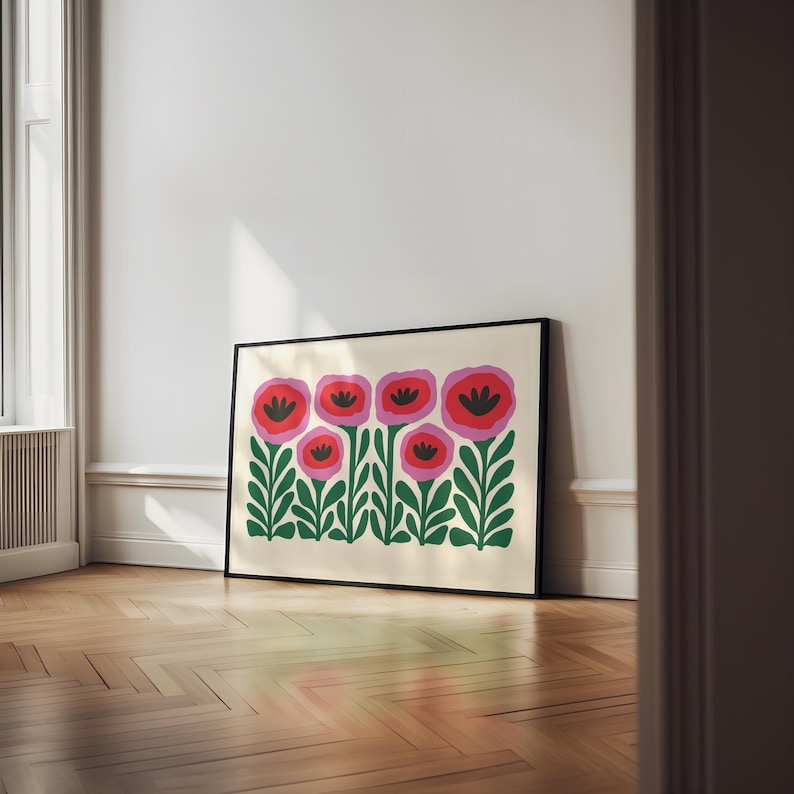 May include: A framed print of a stylized floral design featuring pink and red flowers with green leaves on a cream background.