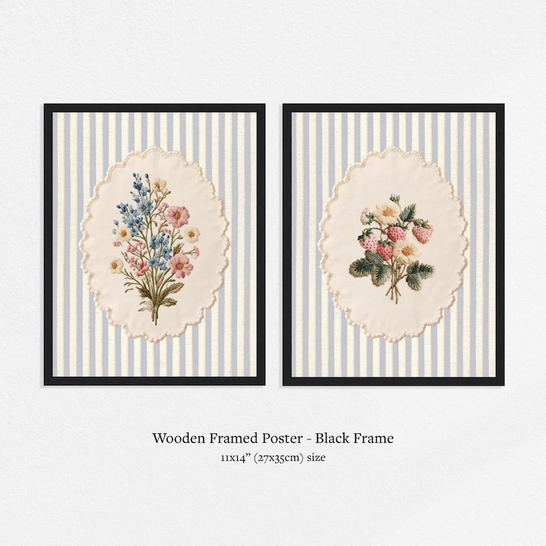 May include: Two framed floral prints. Each print features a detailed botanical illustration within a cream-colored, scalloped oval. The backgrounds are light blue and white striped. The frames are black. The size is 11x14 inches.