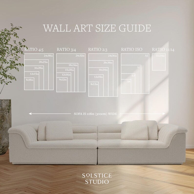 May include: A wall art size guide with different ratios and measurements in inches. The guide shows the size of artwork that would look good above a sofa that is 118 inches wide. The text "SOFA IS 118in (300cm) WIDE" is below the guide.