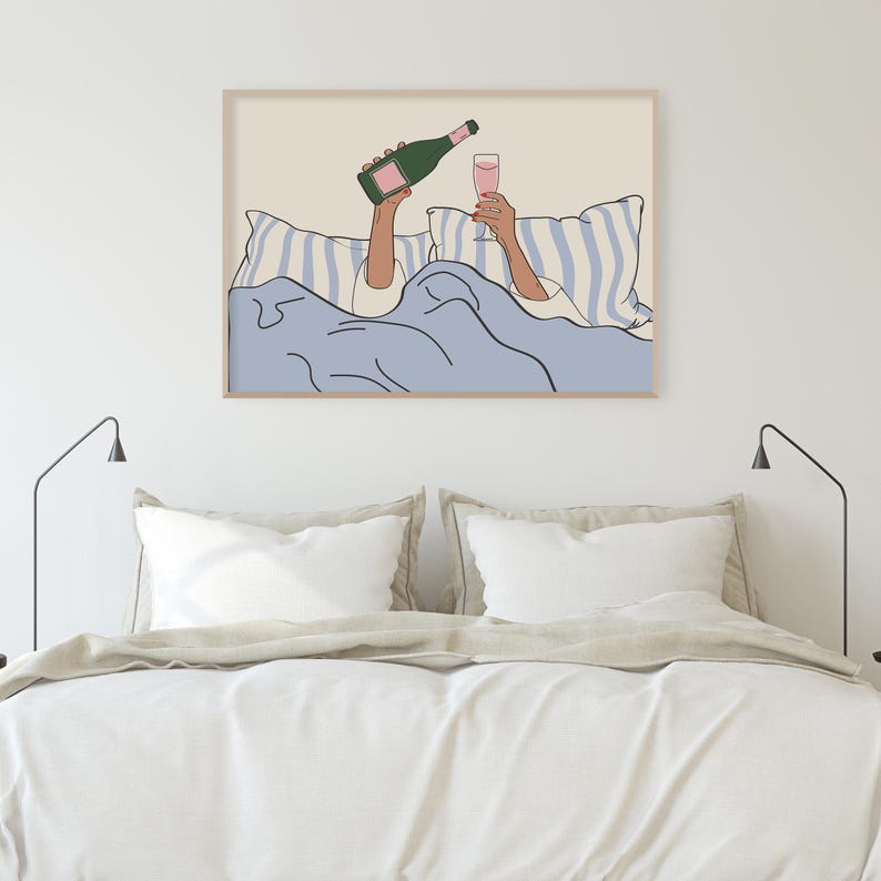 May include: A digital illustration of a person in bed with a glass of pink champagne and a bottle of champagne. The person is under a blue blanket with white stripes. The background is a light beige colour.