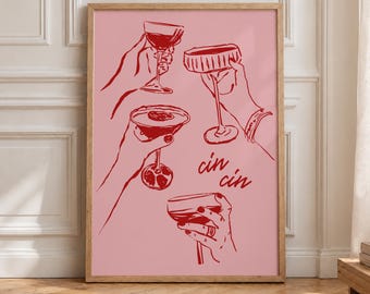 May include: A framed wall art print featuring a light pink background with red line art illustrations of four hands holding various cocktail glasses. The text cin cin is written in red script in the center of the composition.