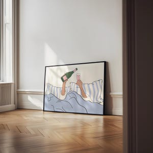 May include: A digital illustration of a person in bed, holding a glass of pink champagne and a bottle of champagne. The person is under a blue blanket with white and blue striped pillows.