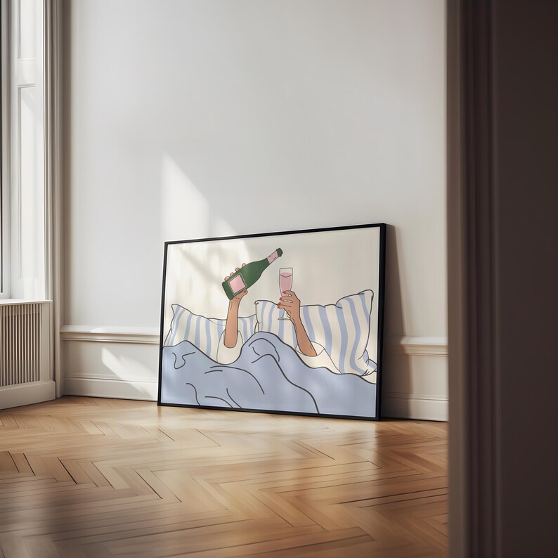 May include: A digital illustration of a person in bed, holding a glass of pink champagne and a bottle of champagne. The person is under a blue blanket with white and blue striped pillows.