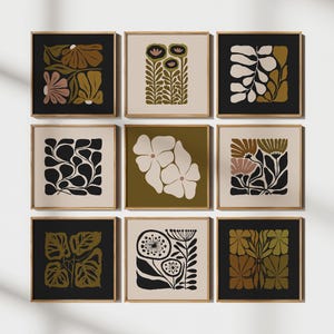 May include: Nine square prints with abstract floral designs in black, white, green, and brown. The prints are framed in a light wood frame.