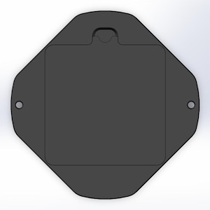 May include: A black octagonal-shaped plastic box with a rectangular opening and a small handle on the top.