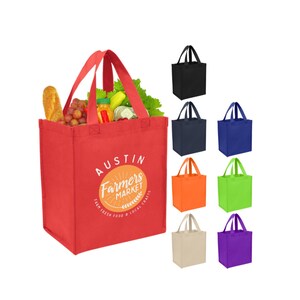 May include: A red reusable tote bag filled with groceries, featuring the "Austin Farmers Market" logo. Additional bags in black, navy, blue, orange, green, beige, and purple are displayed. The bags have sturdy handles.