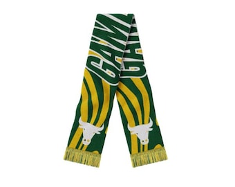 May include: Green and gold scarf with the word "GAME" in white. The scarf has a bull graphic and gold fringe at the ends. The scarf is made of a soft material.