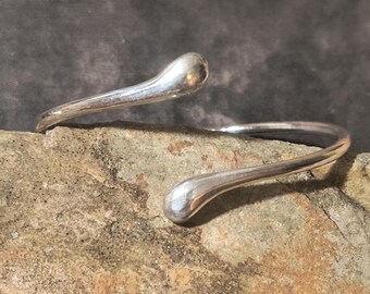 Sterling Silver Bangle Bracelet with a Liquid, Teardrop Theme