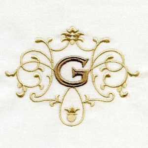 Besticktes Monogramm Gästehandtuch. Schöner Monogramm Buchstabe mit Schriftband. Auswahl der Farbkombination