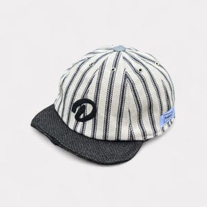 White Cotton Herringbone Baseball Cap with Black Stripes and Jute Roll-up Visor