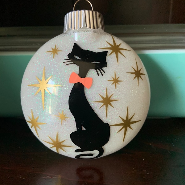 Adorno navideño inspirado en el gato atómico