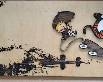 May include: A wooden art piece featuring a cartoon character holding an umbrella and a tiger character jumping on a skateboard. The background is a black and white image of a forest scene.