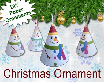 May include: DIY paper ornaments with a snowman design. The ornaments are white with green, blue, and red accents. The text "Christmas Ornament" is at the bottom of the image.