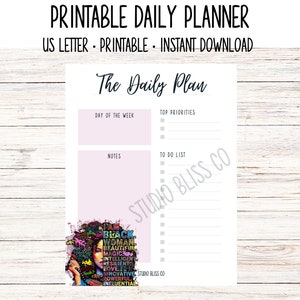 May include: Printable daily planner with a pink background and a colorful illustration of a woman with the text "I am Black Woman" and other words. The planner has sections for the day of the week, top priorities, and a to-do list.