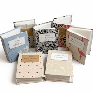 Álbum de 100 fotos personalizado, 15 x 10 cm, tapa dura de yute reciclado, bolsillos de plástico, libro estampado.