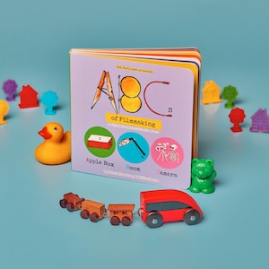 ABC del cine - Libro de cartón para bebés - ¡Domina el ABC mientras aprendes sobre cine!