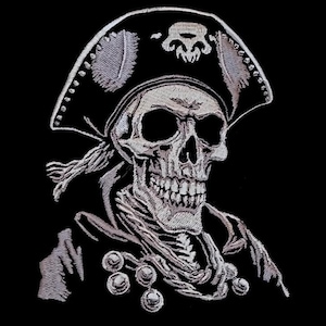 May include: A white embroidered patch depicting a skull wearing a pirate hat. The skull is intricately designed with a bandana and a necklace of beads.