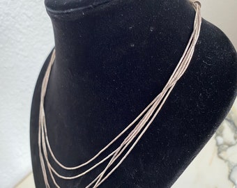 Colar vintage Navajo em prata esterlina com pingente em cascata, década de 1970.