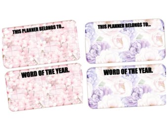 May include: Four rectangular planner cards with floral designs. Two cards feature pink flowers, and the other two have purple and white flowers. Each card has the text "THIS PLANNER BELONGS TO..." and "WORD OF THE YEAR."