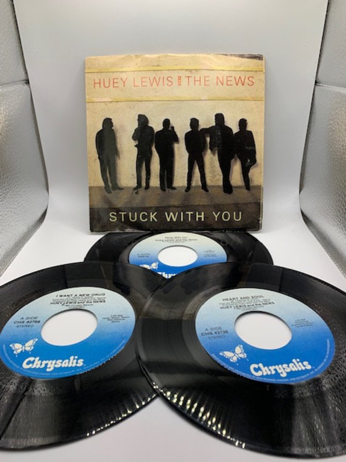 Vintage Huey Lewis & the News 45 rpm vinyl records, foto 1 di 4