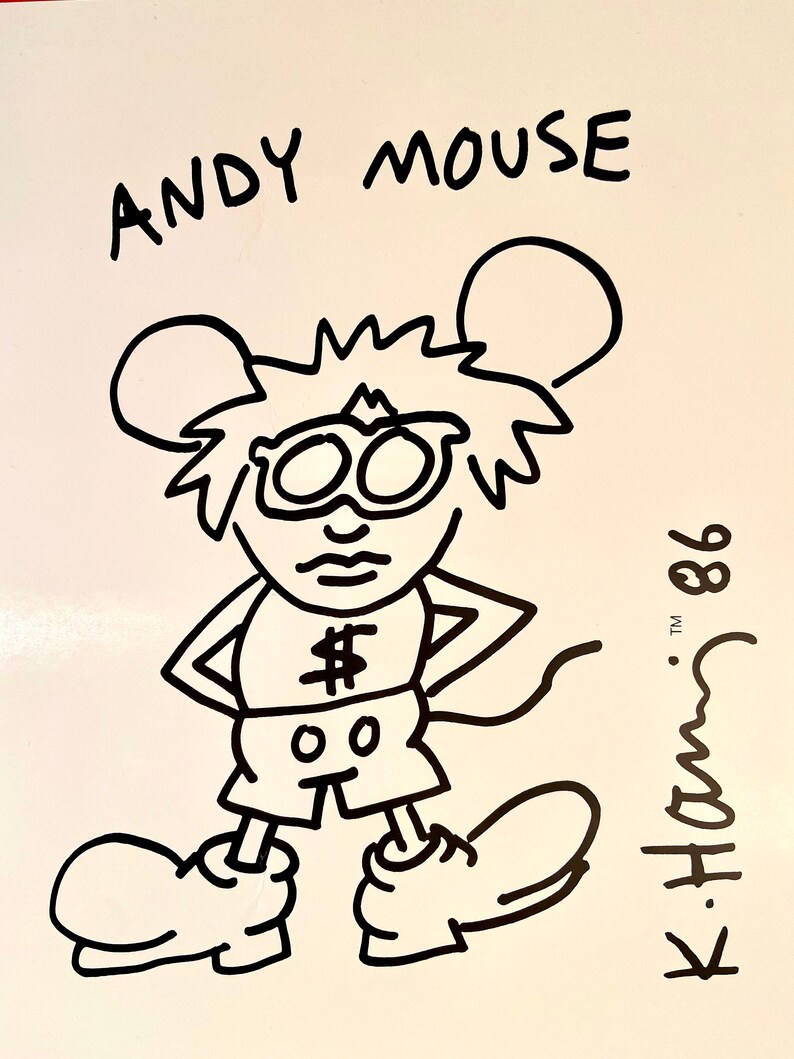 K&ouml;nnte beinhalten: Schwarz-Wei&szlig;-Cartoon-Illustration einer Mausfigur mit dem Text "ANDY MOUSE" dar&uuml;ber. Die Maus tr&auml;gt eine Brille, Shorts und ein Hemd mit einem Dollarzeichen. Signiert "K. Ham" und datiert "86".