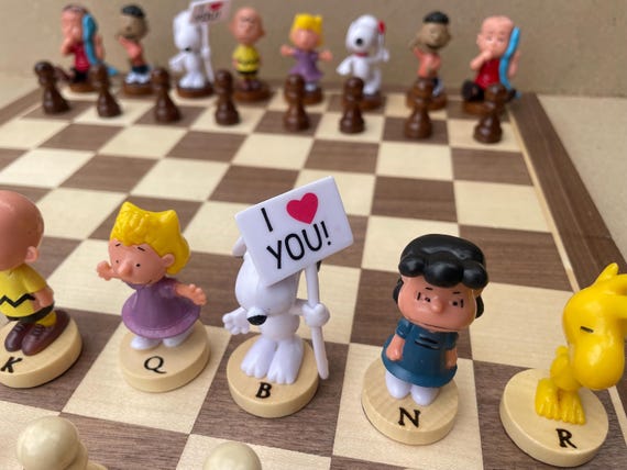 Charlie Brown Sally and Snoop chess set