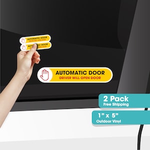 May include: Two yellow and red stickers with the text "Automatic Door Driver Will Open Door" and a red hand icon. The stickers are 1 inch by 5 inches and made of outdoor vinyl.