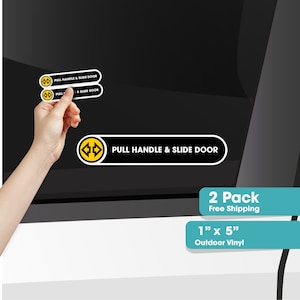 May include: Two black and yellow vinyl stickers with the text "PULL HANDLE & SLIDE DOOR" and a graphic of a double-headed arrow. The stickers are 1 inch by 5 inches.