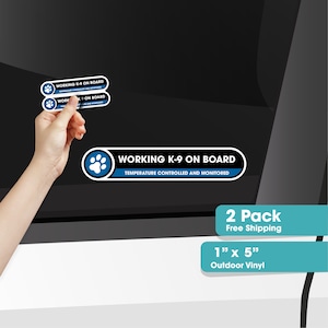 May include: Two blue and white "Working K-9 on Board" decals with a paw print. The decals are 1 inch by 5 inches and made of outdoor vinyl.