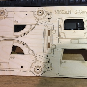 Nissan S-Cargo (escargot) desk tidy and organiser.