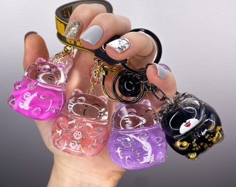 Glückskatze Schlüsselanhänger: Kawaii Treibsand Anhänger mit Floating Glitter