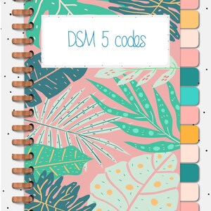 May include: A pink and green notebook with a tropical leaf pattern and the text "DSM 5 codes" on the front cover. The notebook has a spiral binding and colorful tabs on the side.