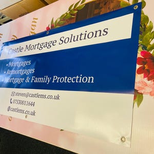 May include: A white banner with blue text that reads "Castle Mortgage Solutions". The banner lists services including mortgages, remortgages, and mortgage and family protection. Contact information is also included: steven@castlems.co.uk, 07530011644, and castlems.co.uk.