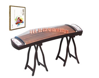 May include: A brown guzheng, a traditional Chinese zither, with 21 strings and a white floral design on the body. The guzheng is resting on a wooden stand with two legs on each side. The instrument is accompanied by a book with the text "古筝" in Chinese characters.
