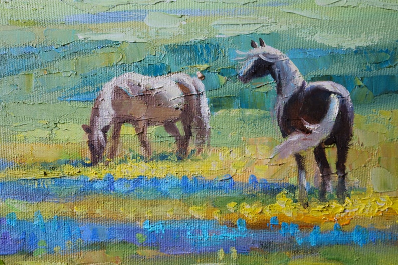 May include: An oil painting on canvas featuring two horses in a field. One horse grazes on yellow flowers while the other stands facing right. The background consists of textured, impasto brushstrokes in shades of green, blue, and yellow.