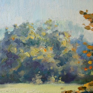 May include: An oil painting on canvas depicting a landscape with thick, textured brushstrokes. The scene features dense foliage in shades of deep blue, green, and purple, contrasted by bright orange and yellow leaves on the right side.