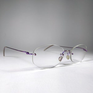 LINDBERG © Spirit Titanium Pat. Pend.  Rimless Eyewear. No.502062521. Made in Denmark