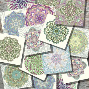 May include: A collection of square cards featuring intricate mandala designs in various colors. The cards showcase floral and geometric patterns in shades of blue, purple, green, and yellow. The cards are arranged on a wooden surface.