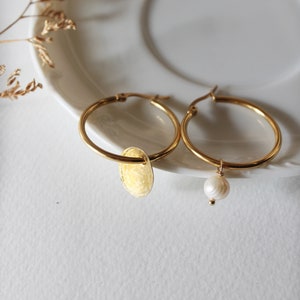 Hoop earrings with brass pendant