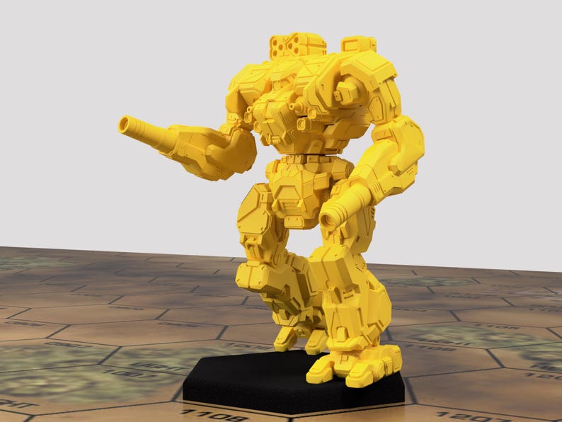 May include: A yellow plastic miniature robot with a large gun on its left arm. The robot is standing on a black base.