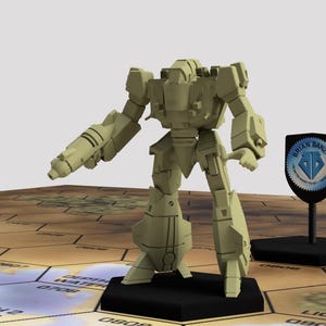 May include: A beige plastic model of a robot with a large gun in its right hand. The robot is standing on a hexagonal game board with a blue and white logo in the background.