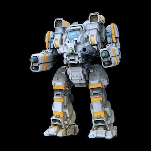 May include: A detailed model of a grey and yellow mech robot, set against a black backdrop. The robot features multiple weapon ports, a cockpit with a blue window, and the word "TRAINER" printed on its torso. The design incorporates angular shapes and industrial details.