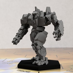 May include: A grey, articulated, humanoid robot with a large gun on its left arm and a shield on its right arm. The robot is standing on a black hexagonal base.